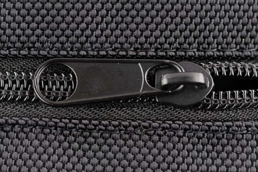 ge of a black zip on a carry on bag. DIY Luggage Repair: Including How to Fix a Broken Zipper