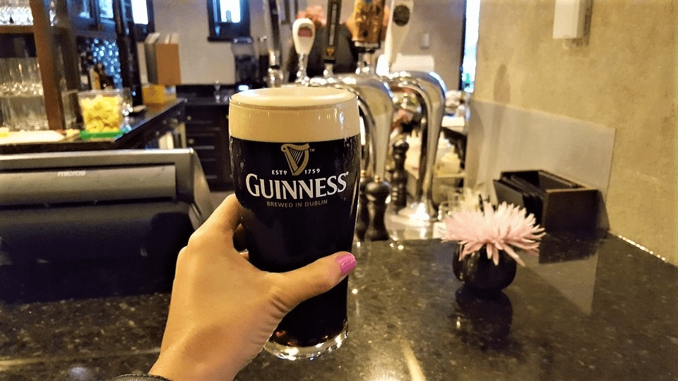 Guinness: Iconic Irish stout beer, known for dark color, creamy head